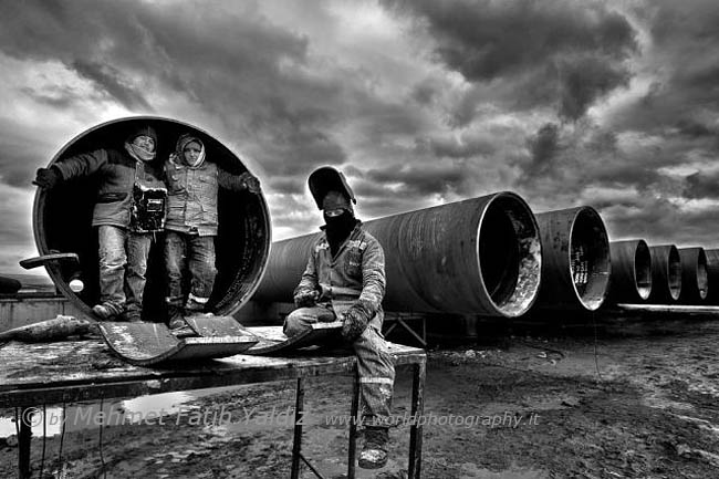 Steel pipe workers 5