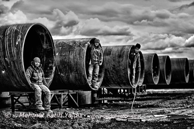 Steel pipe workers 8